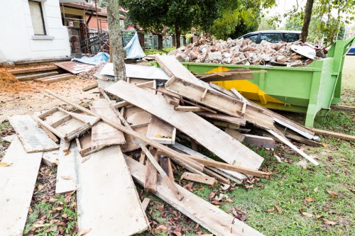 Residents disposing of old furniture in Limehouse